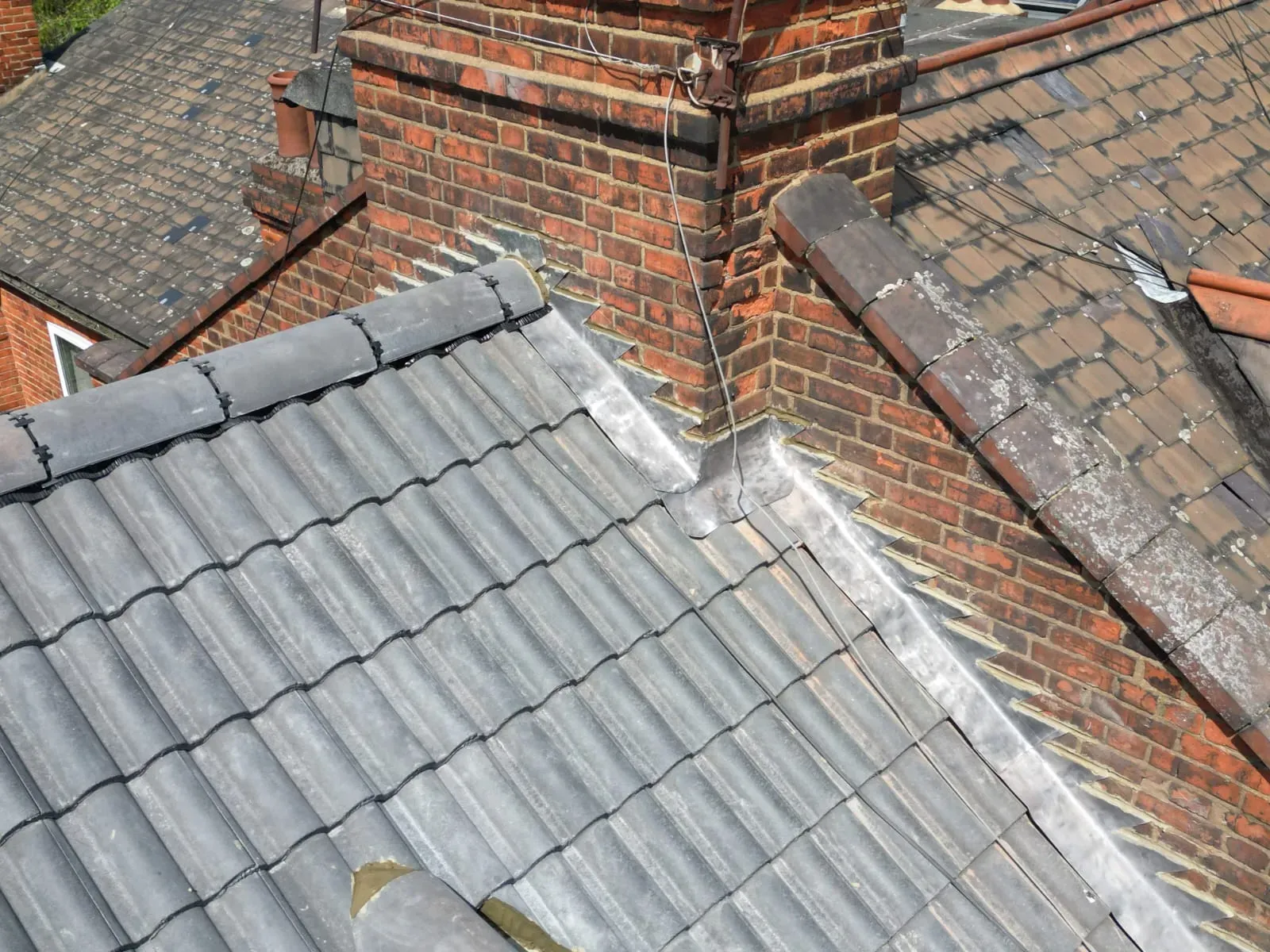 Chimney Repairs service by Rooflex Roofing Solutions